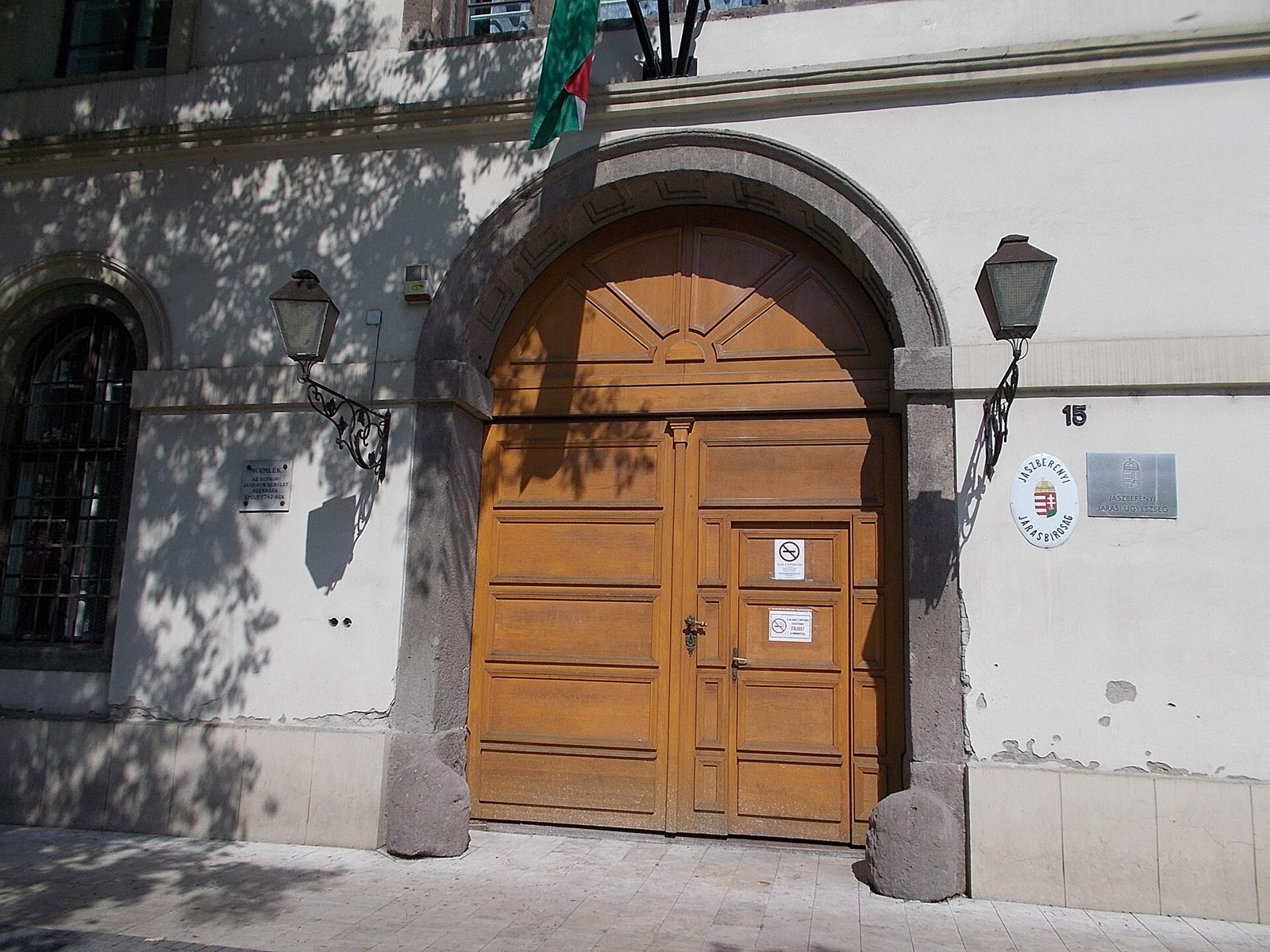 The arched wooden gate of the Jászkun District House in Jászberény