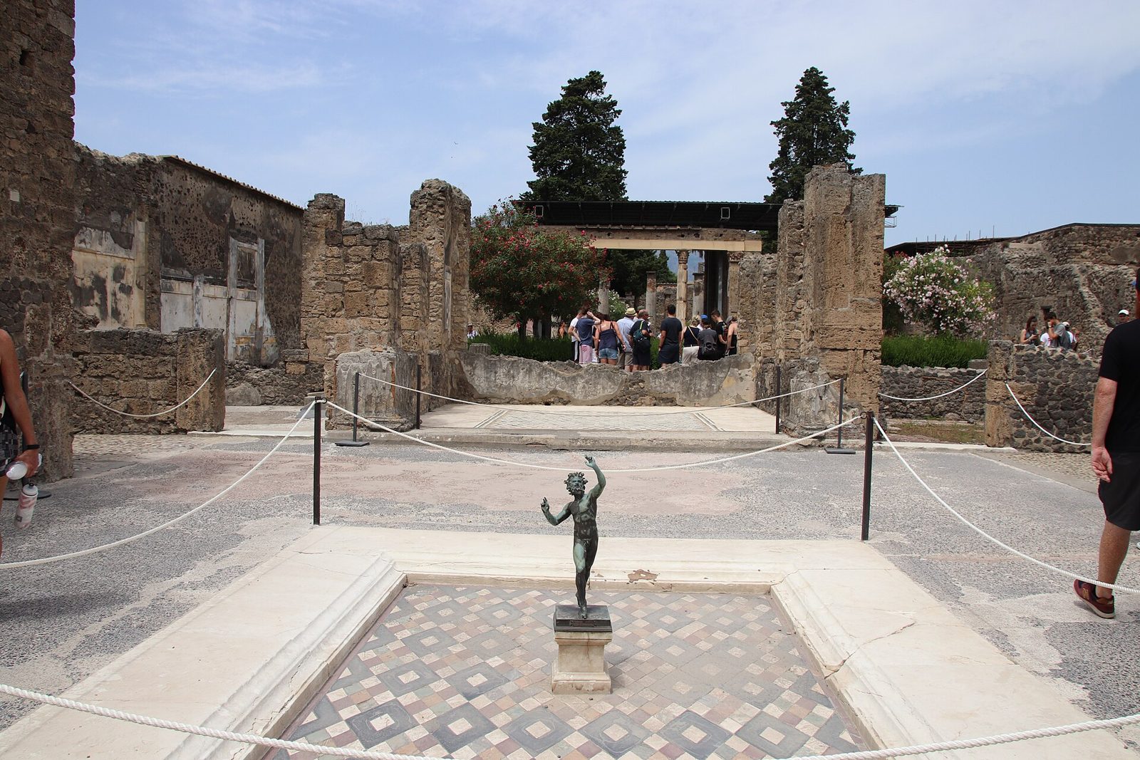 A bronze copy of the dancing faun in the atrium pool of the House of the Faun, Pompeii