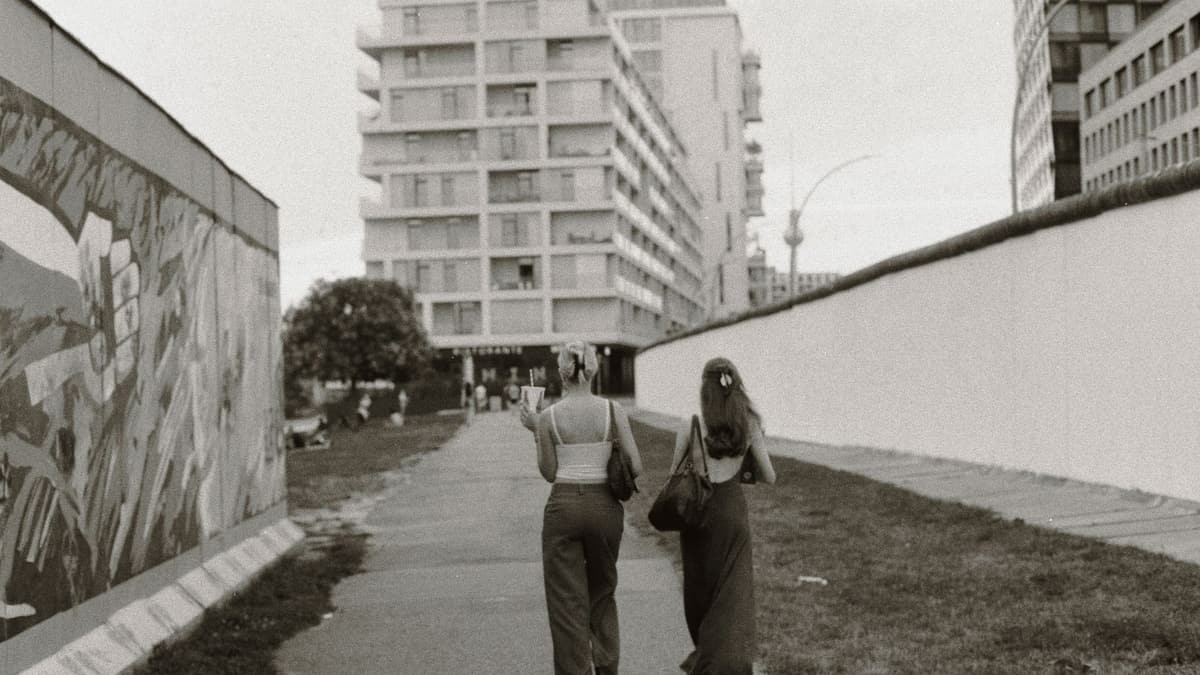 Walking beside a preserved stretch of the Berlin Wall