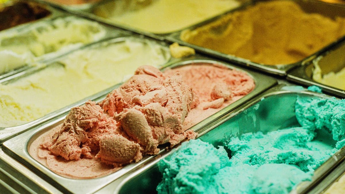 Tubs of gelato in a shop counter