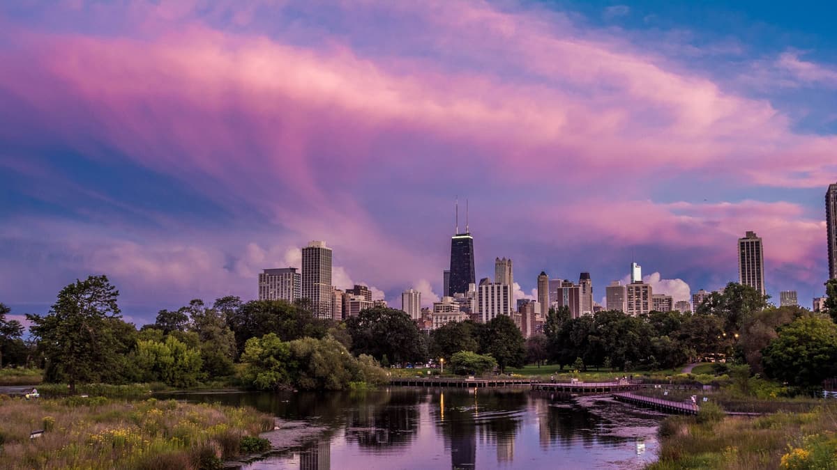 A pond in Lincoln Park with the skyline at sunset, Chicago