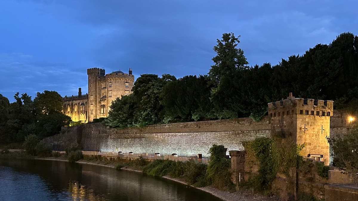 Kilkenny Castle above the Nore at night