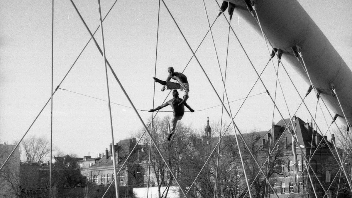 Acrobat sculptures on the Bernatek Footbridge, Kraków