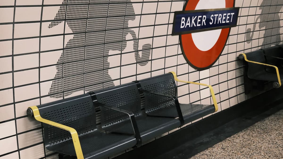 Sherlock Holmes silhouette tiles at Baker Street station, London