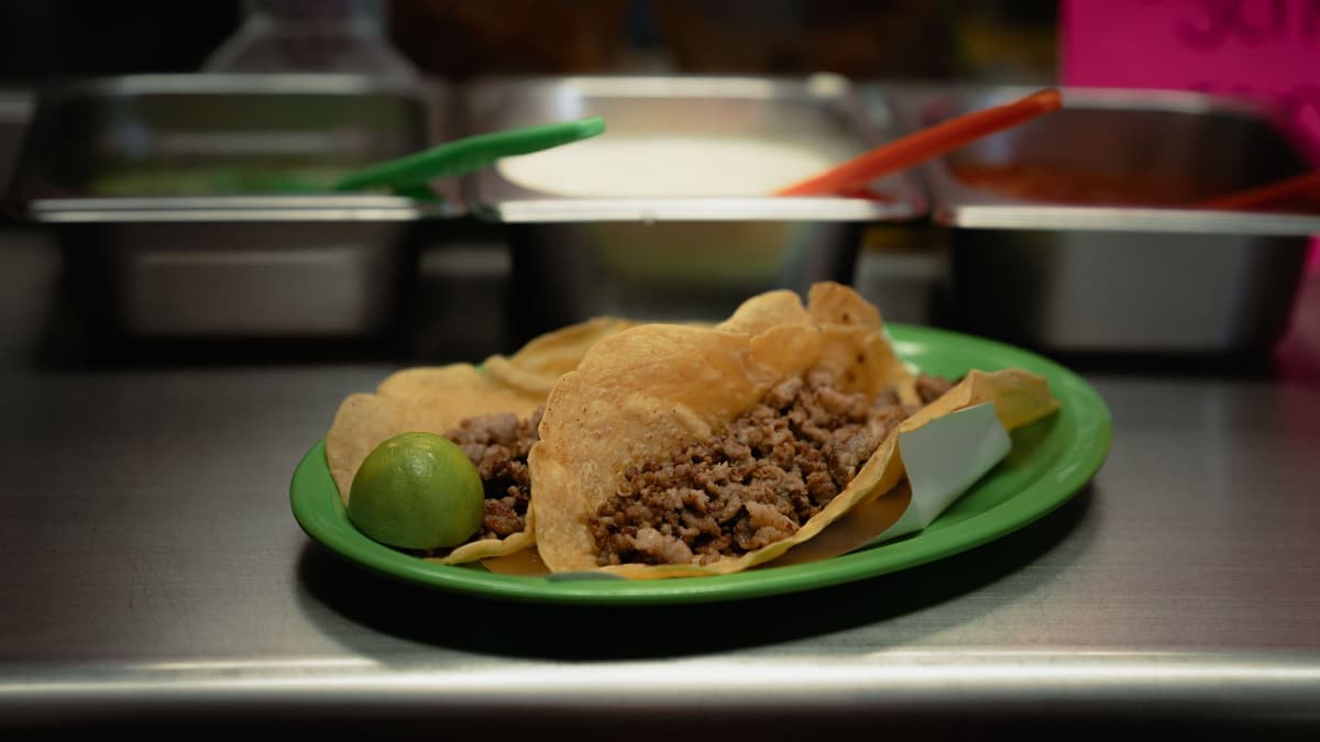 Tacos with lime at a taquería counter in Mexico City