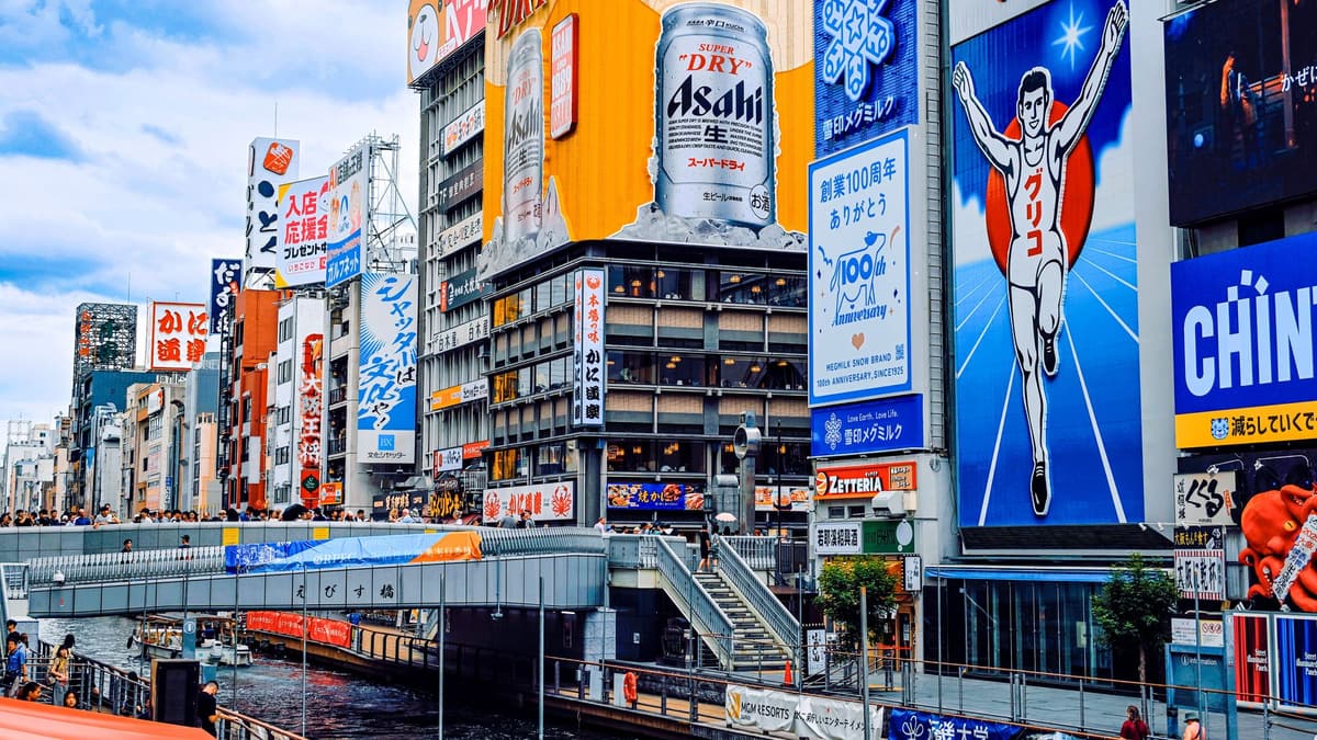 The Glico running man sign over the Dotonbori canal