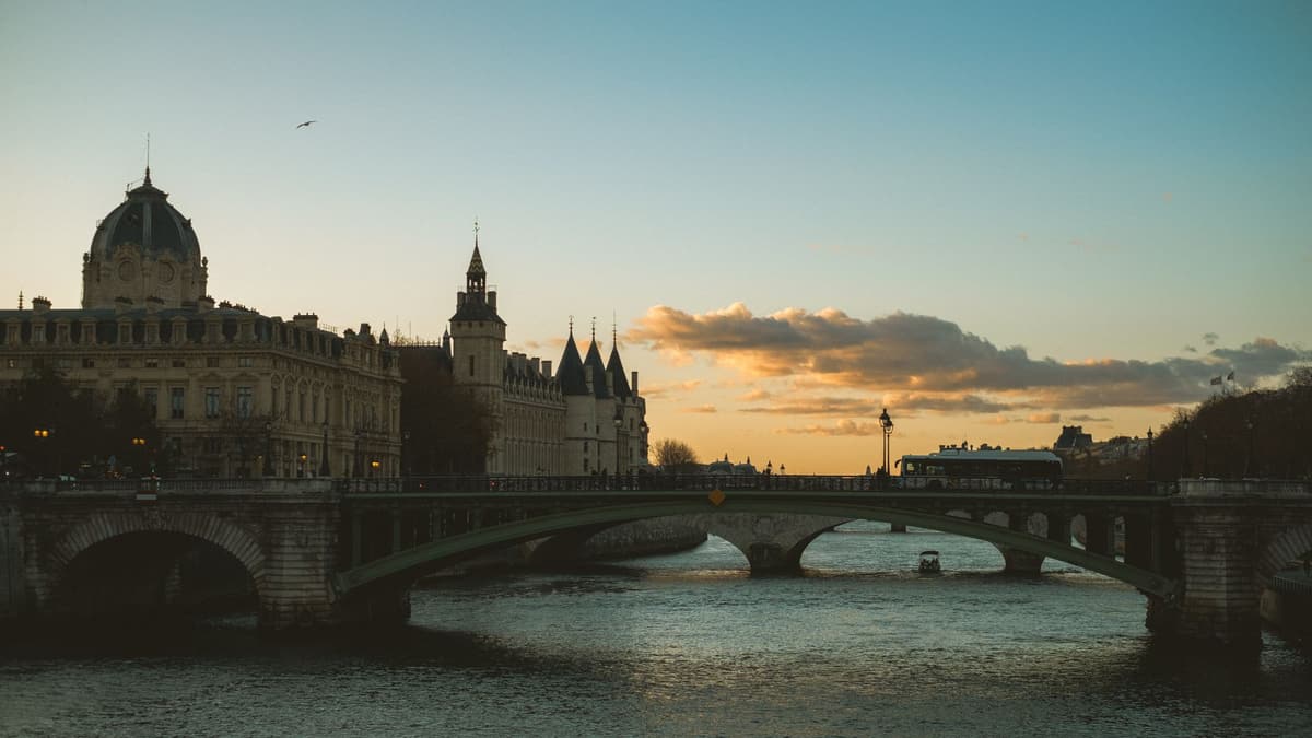 The Conciergerie and the Pont au Change at dusk, Paris