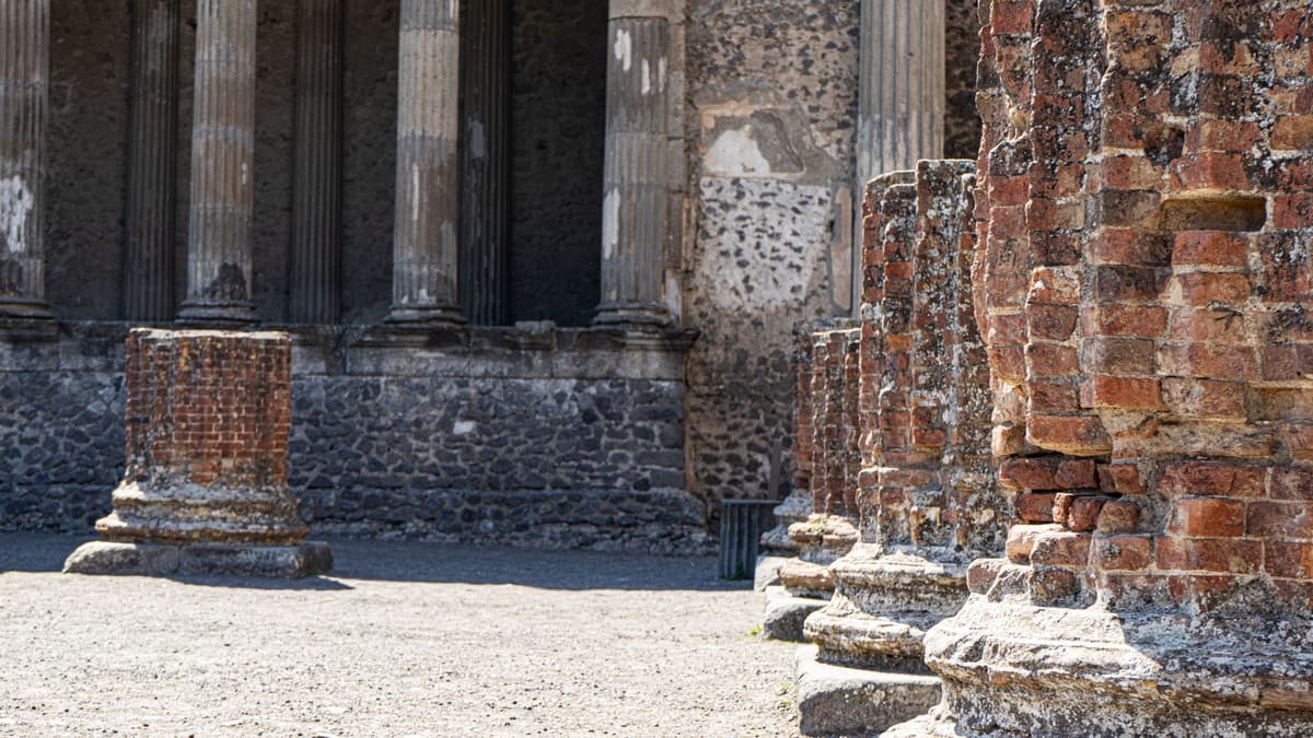 Sunlit columns among the ruins of Pompeii