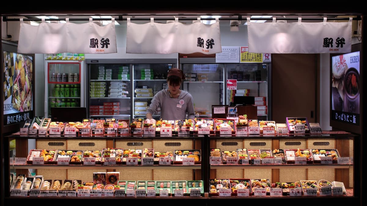 Bento boxes laid out at a Tokyo food counter
