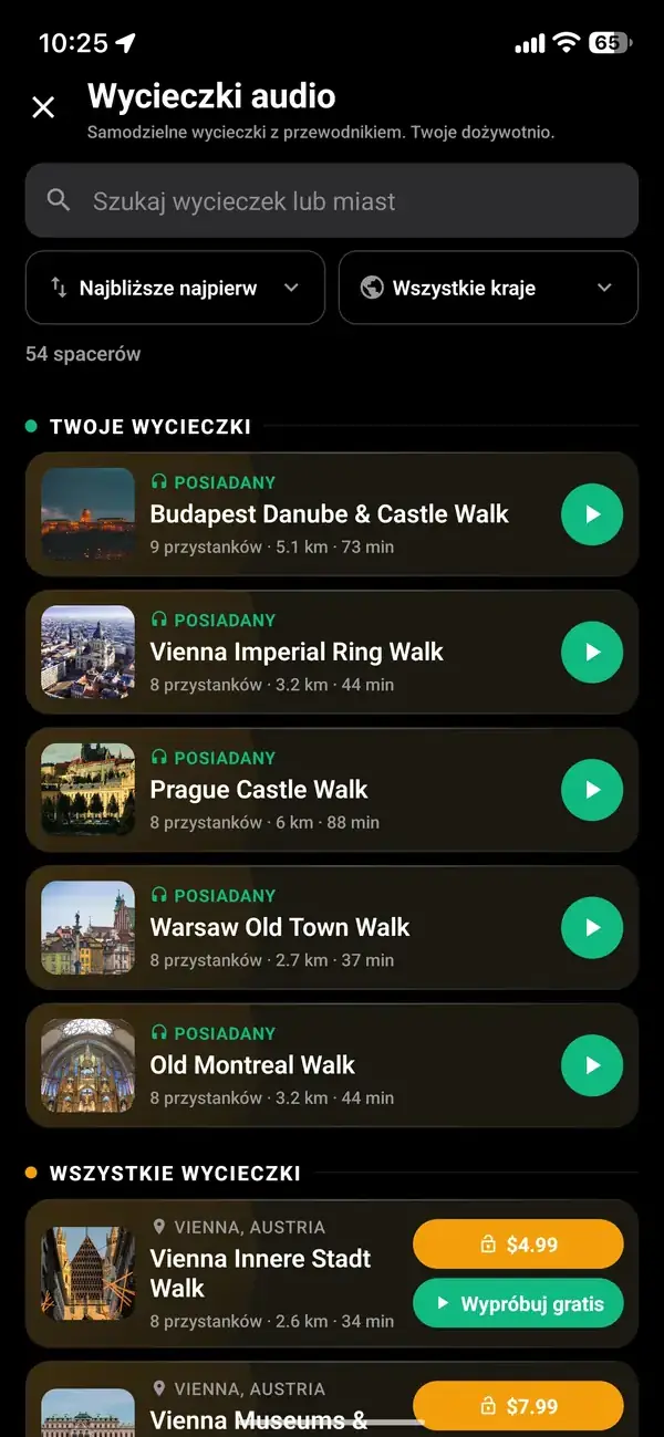 Dotknij złotych słuchawek i wybierz wycieczkę