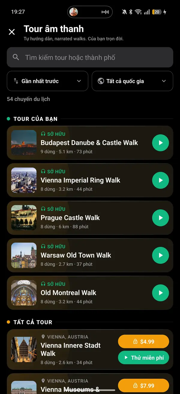 Chạm vào tai nghe vàng và chọn tour